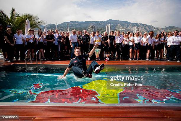 Red Bull Racing Team Principal Christian Horner jumps into the Red Bull Energy Station swimming pool following Mark Webbers victory in the Monaco...