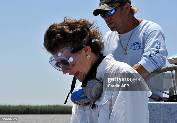 Toxicologist Gina Solomon reacts to her analysis of water samples near Venice, Louisiana, on May 12, 2010. Solomon, on a field trip for the National...