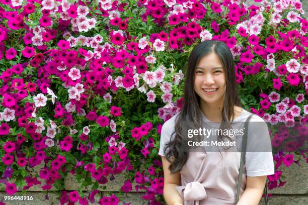 portrait of smiling tourist girl in seoul, south korea - korean female stock pictures, royalty-free photos & images