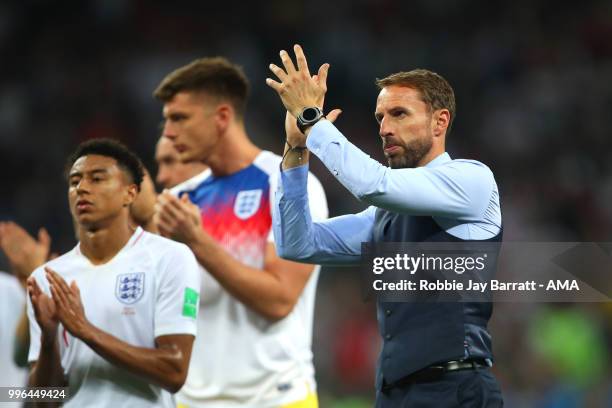 Gareth Southgate head coach / manager of England applauds the fans at the end of extra time during the 2018 FIFA World Cup Russia Semi Final match...