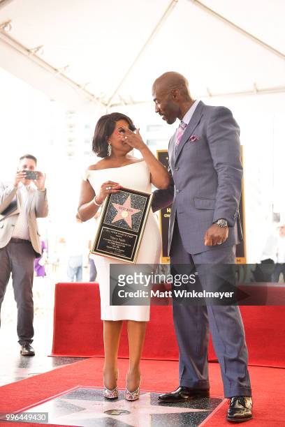 Niecy Nash and Jay Tucker pose for a photo as Niecy Nash is honored with a star on the Hollywood Walk Of Fame on July 11, 2018 in Hollywood,...