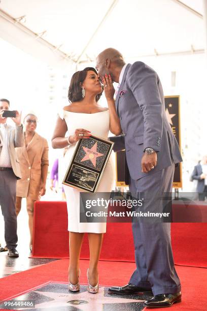 Niecy Nash and Jay Tucker pose for a photo as Niecy Nash is honored with a star on the Hollywood Walk Of Fame on July 11, 2018 in Hollywood,...