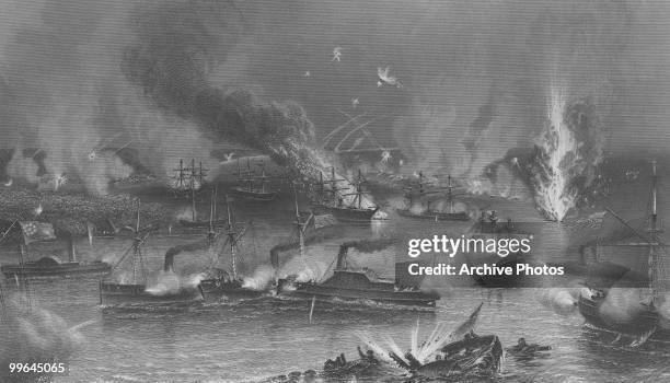 An engraving of the capture of New Orleans, the fleet passing forts on the Mississippi river during the US civil war, circa April, 1862.