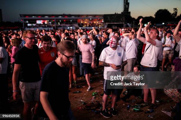 England football fans react after their defeat as they watch the Hyde Park screening of the FIFA 2018 World Cup semi-final match between Croatia and...