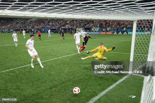 Mario Mandzukic of Croatia scores his team's second goal past Jordan Pickford of England during the 2018 FIFA World Cup Russia Semi Final match...