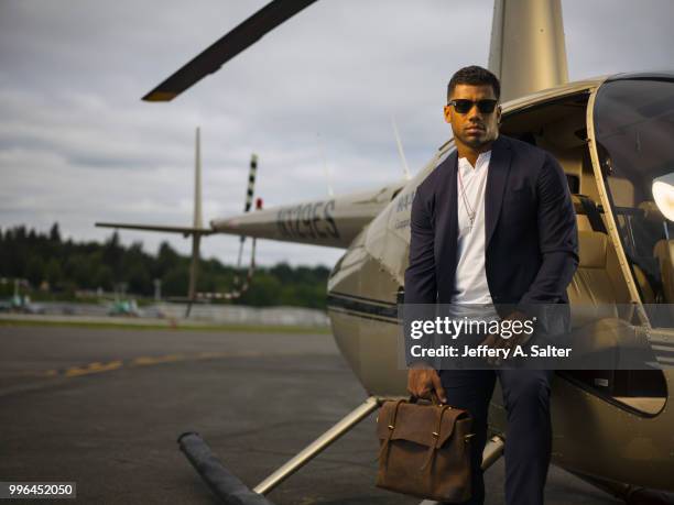 Fashionable 50: Portrait of Seattle Seahawks QB Russell Wilson posing during photo shoot at Clay Lacy Aviation. Seattle, WA 5/16/2018 CREDIT: Jeffery...