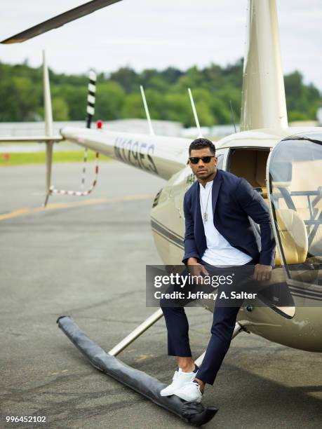 Fashionable 50: Portrait of Seattle Seahawks QB Russell Wilson posing during photo shoot at Clay Lacy Aviation. Seattle, WA 5/16/2018 CREDIT: Jeffery...