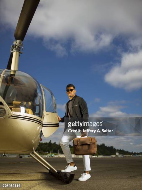 Fashionable 50: Portrait of Seattle Seahawks QB Russell Wilson posing during photo shoot at Clay Lacy Aviation. Seattle, WA 5/16/2018 CREDIT: Jeffery...