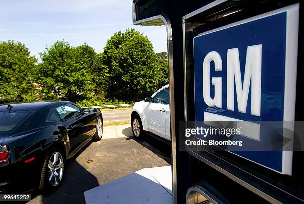 General Motors Co. Vehicles sit on display at Bobby Murray Chevrolet dealership in Raleigh, North Carolina, U.S., on Saturday, May 15, 2010. General...