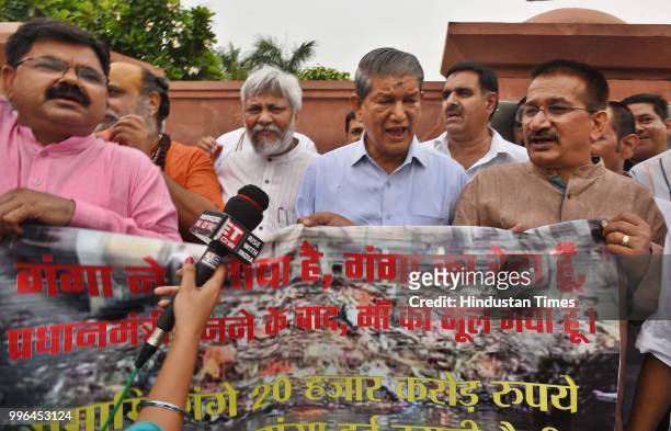 Former Chief Minister of Uttarakhand Harish Rawat with Rajendra Singh during a peace protest against Central Government on the issue of the river...