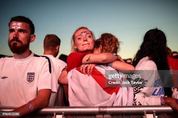 England football fans react after their defeat as they watch the Hyde Park screening of the FIFA 2018 World Cup semi-final match between Croatia and...