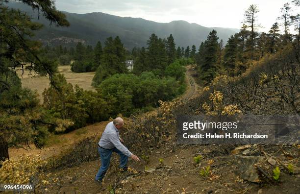 Cres Fleming hikes up the hill in the exact area where he says the 416 fire started on July 10, 2018 near Hermosa, Colorado. Evidence is suggesting...