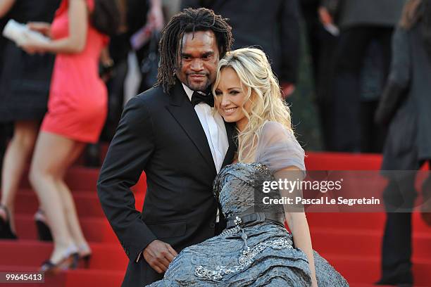 Former footballer Christian Karembeu and model Adriana Karembeu attends "Biutiful" Premiere at the Palais des Festivals during the 63rd Annual Cannes...