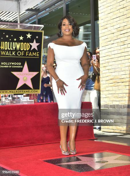 Actress Niecy Nash poses on her Hollywood Walk of Fame Star during a ceremony in Hollywood, California on July 11, 2018. - Niecy Nash was the...