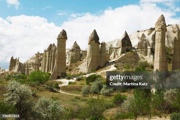 fairy chimneys, tufa formations in love valley, goreme national park, nevsehir province, cappadocia, anatolia, turkey - göreme-historical-national-park stock pictures, royalty-free photos & images