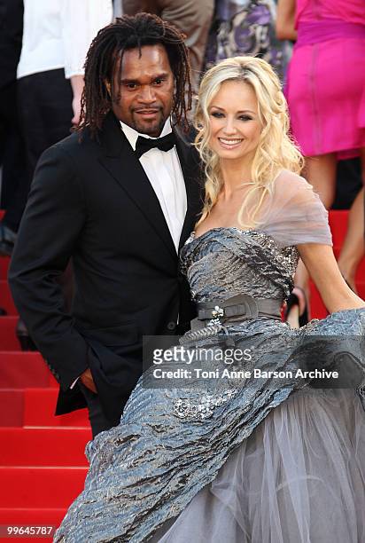 Former footballer Christian Karembeu and model Adriana Karembeu attend the premiere of 'Biutiful' held at the Palais des Festivals during the 63rd...