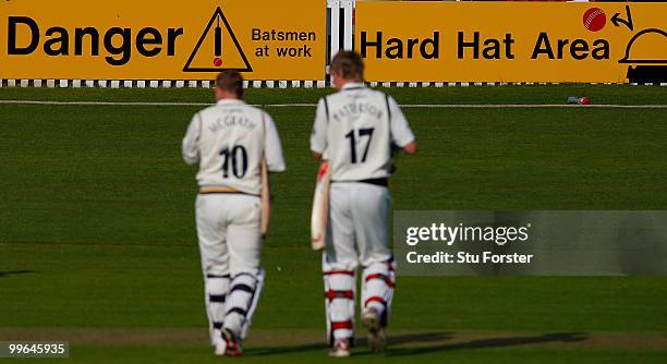 Yorkshire batsmen Anthony McGrath and Steven Patterson leave the field at the end of day one of the LV County Championship Division One match between...