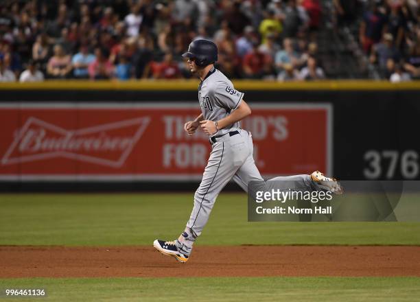 Wil Myers of the San Diego Padres rounds the bases after hitting a home run against the Arizona Diamondbacks at Chase Field on July 7, 2018 in...