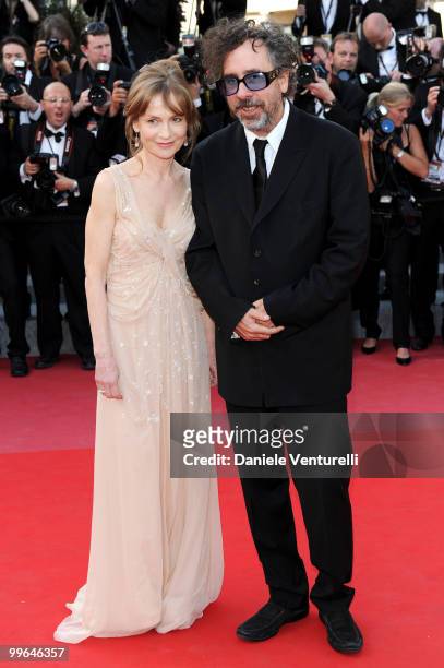 Actress Isabelle Huppert and director and president of the jury Tim Burton attend the premiere of 'Biutiful' held at the Palais des Festivals during...