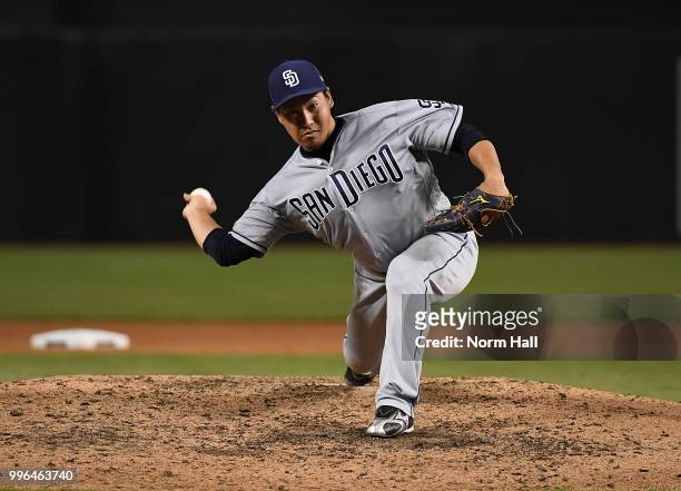 Kazuhisa Makita of the San Diego Padres delivers a warm up pitch during the fourth inning against the Arizona Diamondbacks at Chase Field on July 7,...