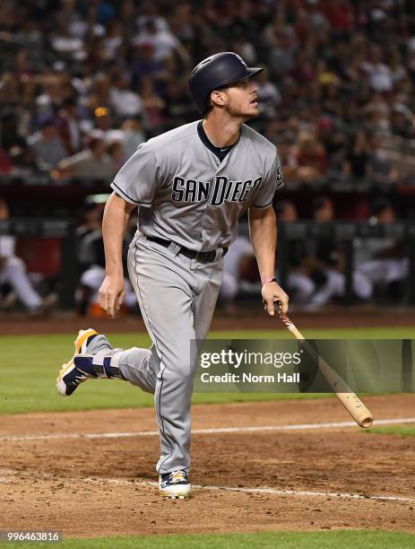 Wil Myers of the San Diego Padres hits his third home run of the game during the seventh inning against the Arizona Diamondbacks at Chase Field on...