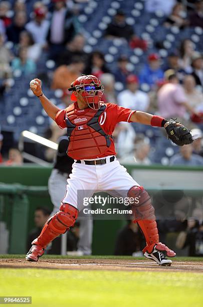 Ivan Rodriguez of the Washington Nationals throws the ball to second base during the game against the Colorado Rockies at Nationals Park on April 22,...