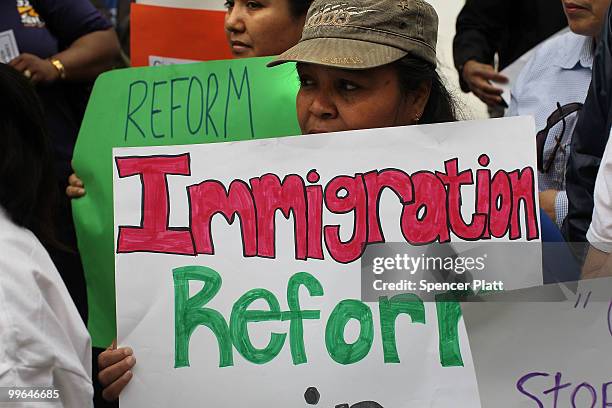 People rally before an act of civil disobedience to protest against the lack of an immigration reform bill on May 17, 2010 in New York, New York....