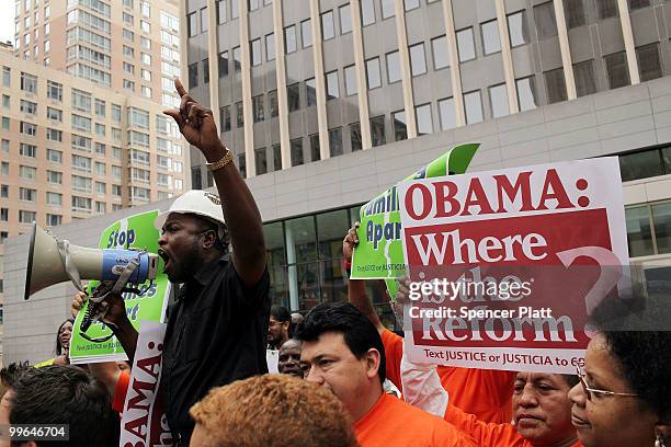 People rally before an act of civil disobedience to protest against the lack of an immigration reform bill on May 17, 2010 in New York, New York....