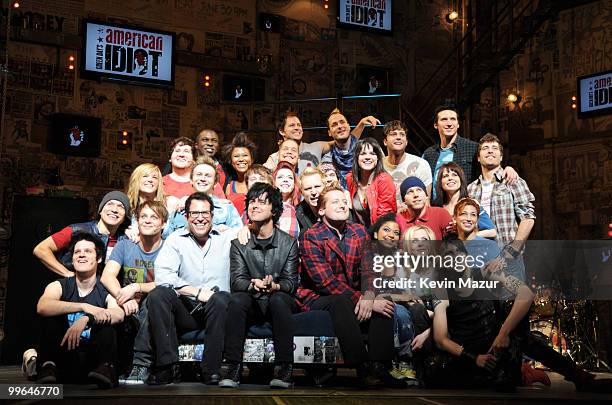 Director Michael Mayer, Billie Joe Armstrong, Mike Dirnt and Tre Cool of Green Day and the cast of "American Idiot" on stage during the "American...