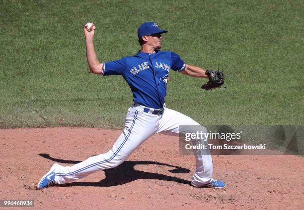 Tyler Clippard of the Toronto Blue Jays delivers a pitch in the tenth inning during MLB game action against the New York Yankees at Rogers Centre on...
