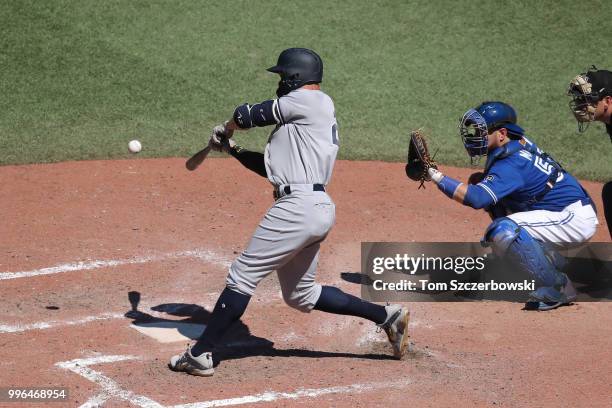 Giancarlo Stanton of the New York Yankees bats in the tenth inning during MLB game action against the Toronto Blue Jays at Rogers Centre on July 8,...