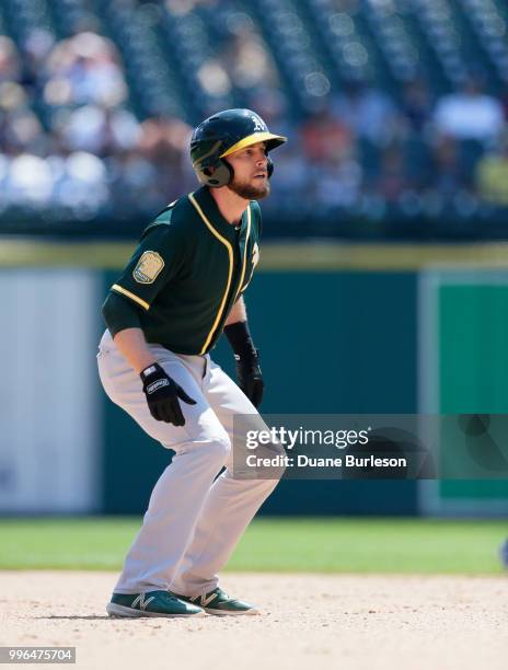 Jed Lowrie of the Oakland Athletics leads off second base against the Detroit Tigers at Comerica Park on June 28, 2018 in Detroit, Michigan.