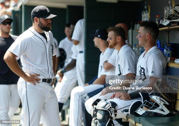 Starting pitcher Michael Fulmer of the Detroit Tigers talks with catcher James McCann of the Detroit Tigers during a game against the Oakland...