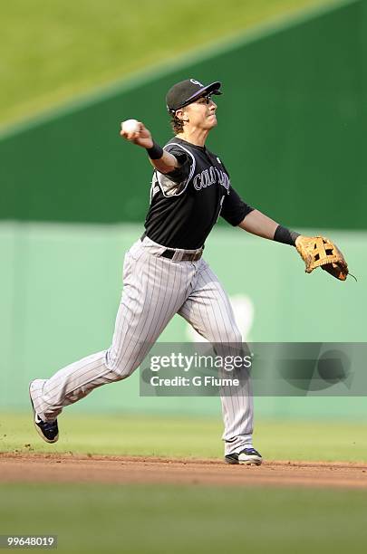 Troy Tulowitzki of the Colorado Rockies throws the ball to first base against the Washington Nationals at Nationals Park on April 22, 2010 in...