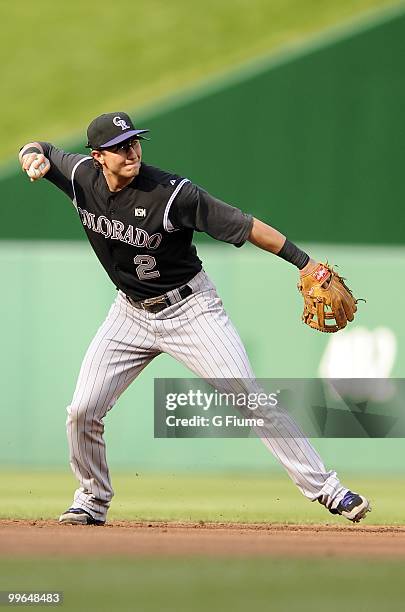 Troy Tulowitzki of the Colorado Rockies throws the ball to first base against the Washington Nationals at Nationals Park on April 22, 2010 in...