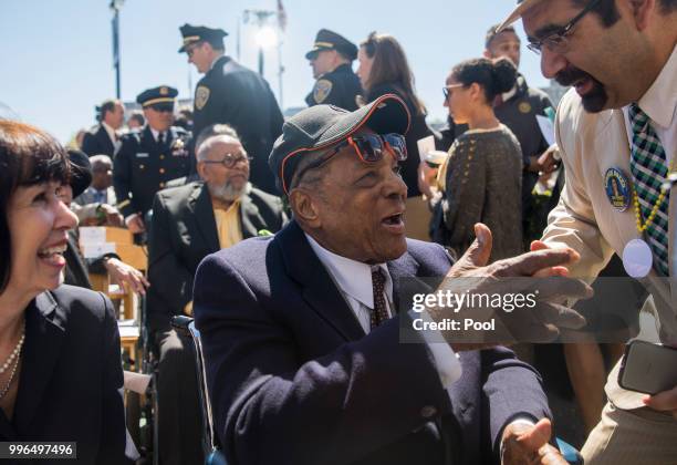 San Francisco Giants baseball Hall of Famer Willie Mays greets VIP attendees during the inauguration ceremony for Mayor London Breed on the steps of...