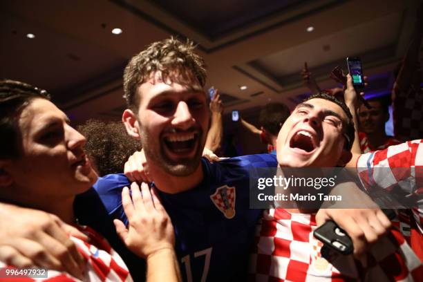 Croatia fans celebrate at a watch party in Saint Anthony Croatian Catholic Church after Croatia defeated England 2-1 to advance to the World Cup...