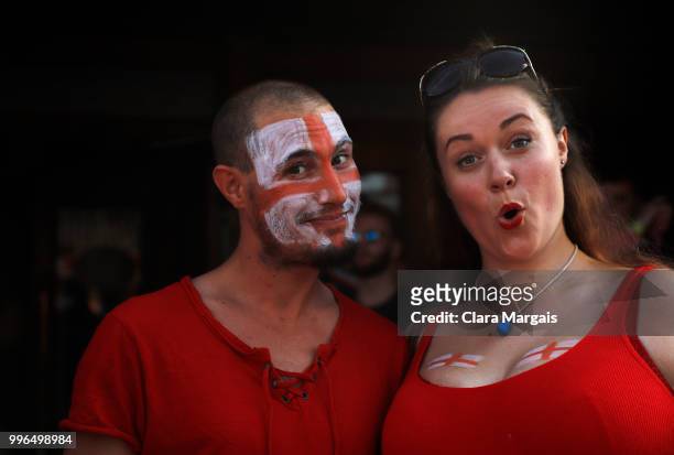 England fans pose in an open air viewing area before the start of the World Cup semi-final match against Croatia on July 11, 2018 in Magaluf,...