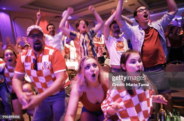 Croatia fans celebrate at a watch party in Saint Anthony Croatian Catholic Church at the moment Croatia defeated England 2-1 to advance to the World...