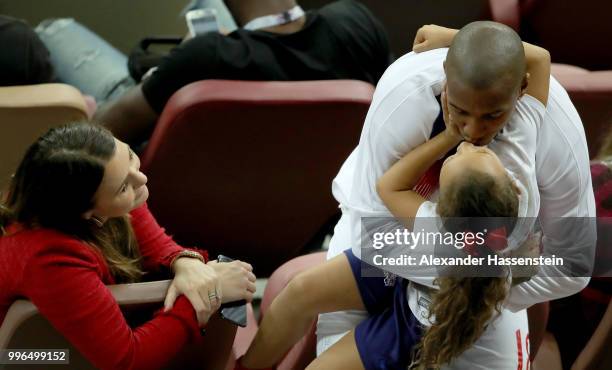 Ashley Young of England hugs his daughter during the 2018 FIFA World Cup Russia Semi Final match between England and Croatia at Luzhniki Stadium on...