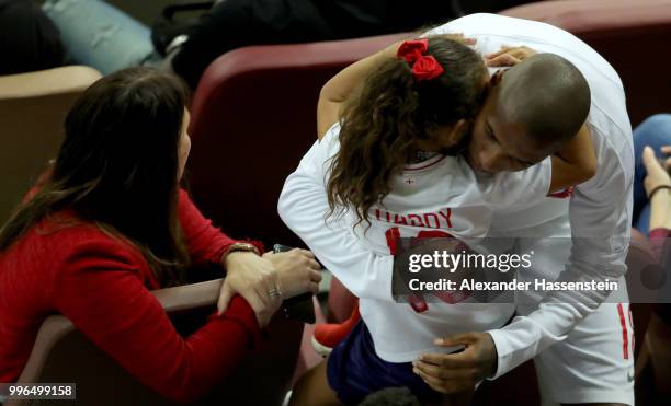 Ashley Young of England hugs his daughter during the 2018 FIFA World Cup Russia Semi Final match between England and Croatia at Luzhniki Stadium on...