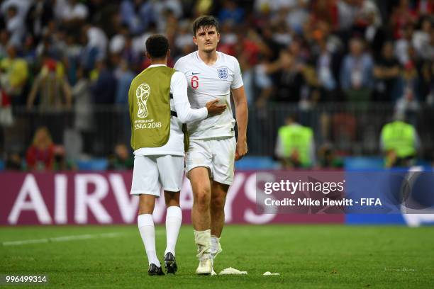 Harry Maguire of England looks dejected following his sides defeat following the 2018 FIFA World Cup Russia Semi Final match between England and...