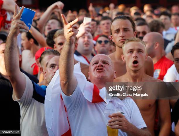 England fans gather to watch the World Cup semi-final match against Croatia in an outside viewing area on July 11, 2018 in Magaluf at Mallorca,...