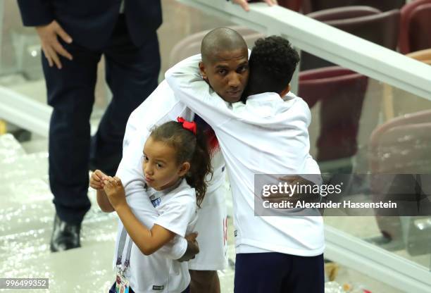 Ashley Young of England hugs his son following the 2018 FIFA World Cup Russia Semi Final match between England and Croatia at Luzhniki Stadium on...