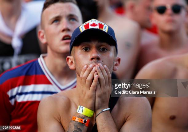 An England fan reacts while watching the World Cup semi-final match against Croatia on a giant screen in an open air viewing area on July 11, 2018 in...