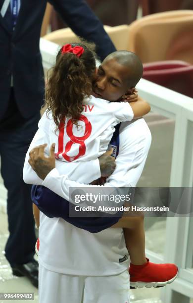 Ashley Young of England hugs his daughter during the 2018 FIFA World Cup Russia Semi Final match between England and Croatia at Luzhniki Stadium on...