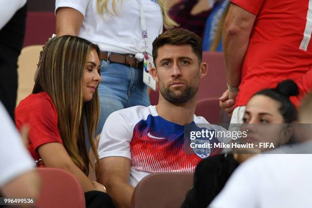 Gary Cahill of England is consoled by his wife, Gemma Acton following his sides defeat in the 2018 FIFA World Cup Russia Semi Final match between...