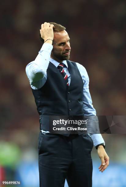 Gareth Southgate, Manager of England stands dejected during the 2018 FIFA World Cup Russia Semi Final match between England and Croatia at Luzhniki...