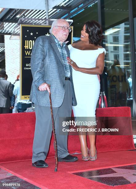 Actress Niecy Nash greets actor Ed Asner on her Hollywood Walk of Fame Star during a ceremony in Hollywood, California on July 11, 2018. - Niecy Nash...