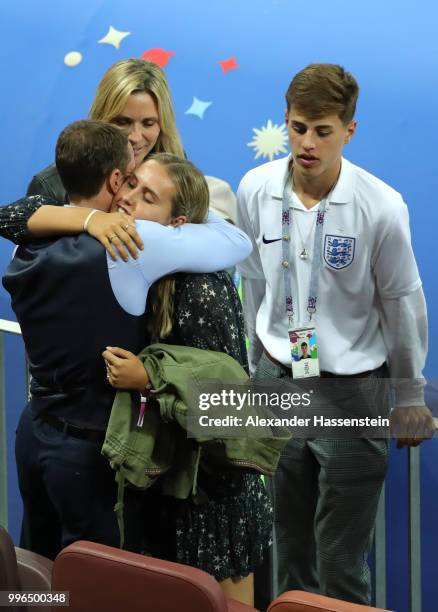 Gareth Southgate, Manager of England is consoled by his family members during the 2018 FIFA World Cup Russia Semi Final match between England and...